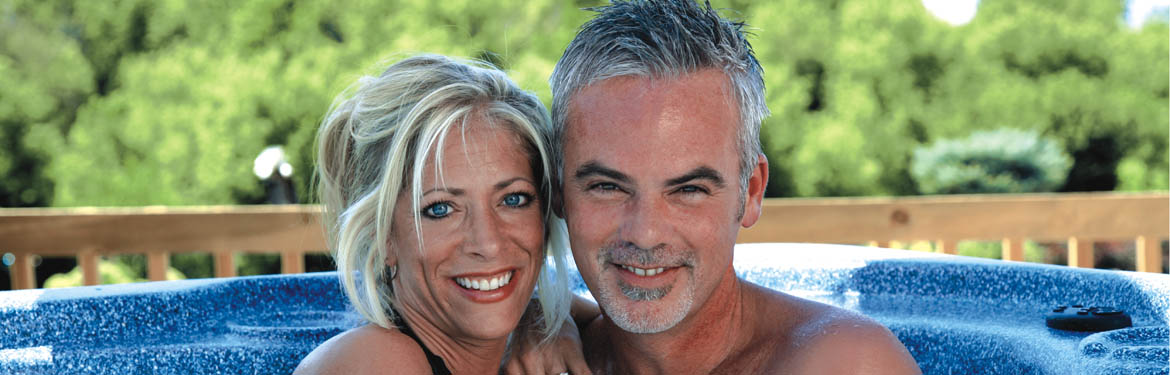 Couple relaxing in a hot tub